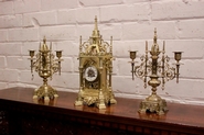 Gothic clock set in bronze