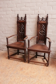 Gothic style arm chairs in oak