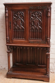 Gothic style credenza in walnut.