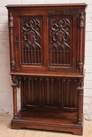 Gothic style credenza in walnut.