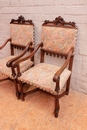 Gothic style 2 arm chairs and 10 chairs in Walnut, France 19th century