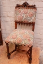 Gothic style 2 arm chairs and 10 chairs in Walnut, France 19th century
