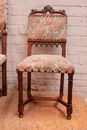Gothic style 2 arm chairs and 10 chairs in Walnut, France 19th century