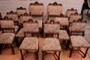 Gothic style 2 arm chairs and 10 chairs in Walnut, France 19th century