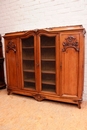 Louis XV style Bookcase in walnut and marble, France 19th century