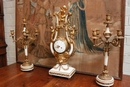 Louis XVI style Mantle clock set in Bronze and marble, France 19th century