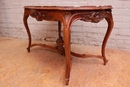 Louis XV style Center table in walnut and marble, France 19th century