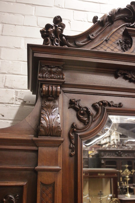 Monumental single door regency style armoire in walnut