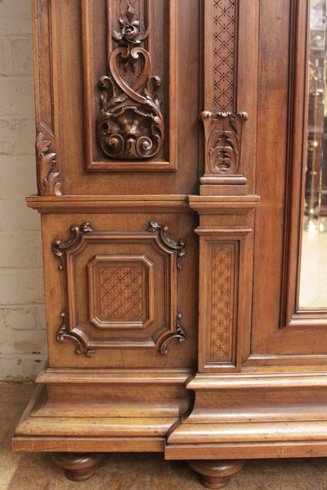 Monumental single door regency style armoire in walnut