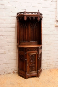 Narrow gothic cabinet in walnut