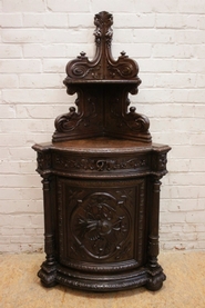 Oak hunt style bombe corner cabinet