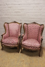 Pair Louis XV bergeres in walnut