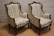 Pair Louis XV style bergeres in walnut