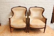 pair Louis XVI mahogany bergeres