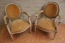 Louis XVI style arm chairs in paint wood, France 1920