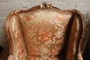 Louis XV style Bergeres in Walnut, France 19th century