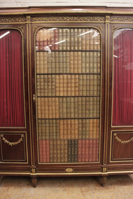 Quality 3 door Louis XVI bookcase in mahogany and bronze