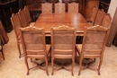 Regency style Table and 12 chairs in Beech wood, France 19th century