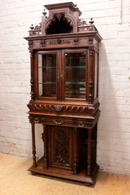 Renaissance style display cabinet in walnut