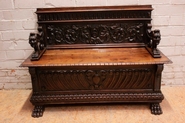 Renaissance style hall bench in walnut.