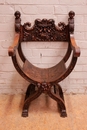 Renaissance style Savona rola arm chair in Walnut, France 19th century