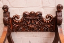 Renaissance style Savona rola arm chair in Walnut, France 19th century