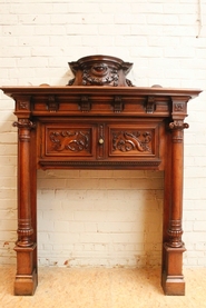 Special Henri II fire mantle in walnut