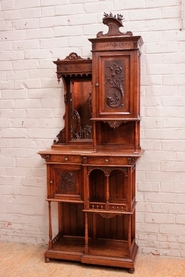 Special narrow renaissance style cabinet in walnut