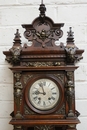 Renaissance style Clock in walnut and bronze, France 19th century