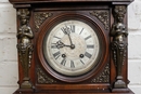 Renaissance style Clock in walnut and bronze, France 19th century