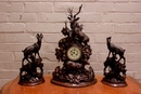 Black forest style Clock set in Walnut, France 19th century