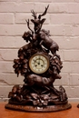 Black forest style Clock set in Walnut, France 19th century