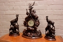 Black forest style Clock set in Walnut, France 19th century