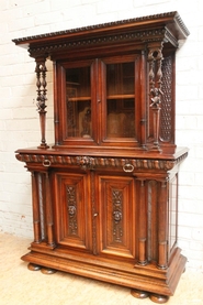 Walnut renaissance joker display cabinet